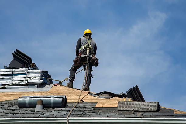 Professional Roofing technician working in Sherborn, MA